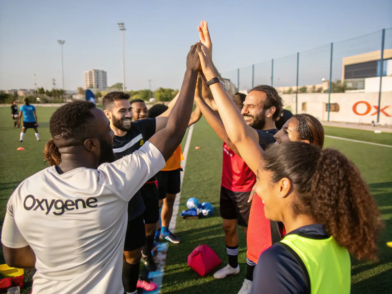A team of athletes celebrating their accomplishment after completing an endurance event, highlighting the importance of teamwork and shared experiences.
